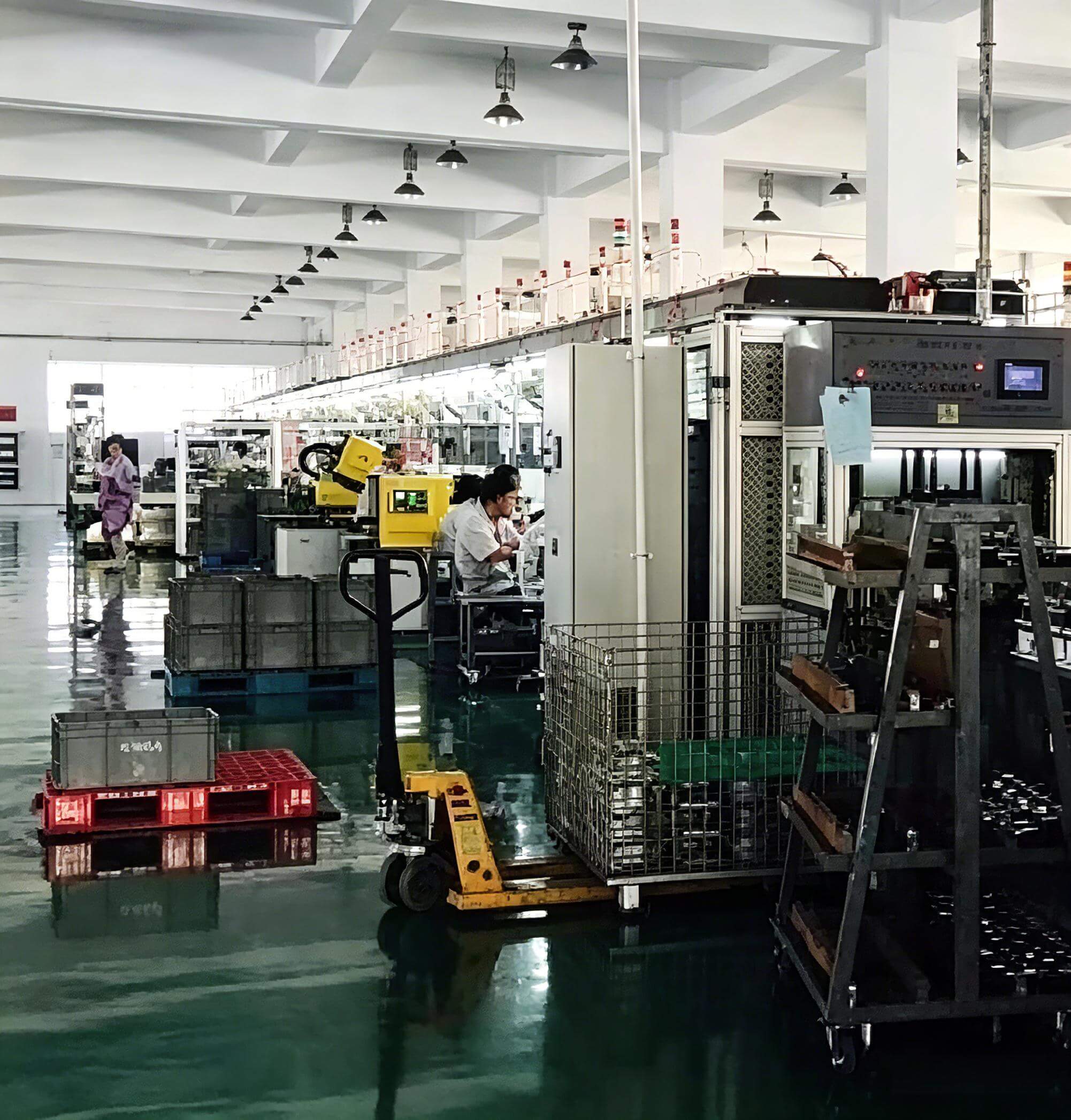 Workers performing quality inspection on outboard motors